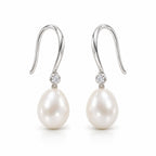 Sidonie pearl earrings, 7-8mm white rice pearls beneath single bezel-set crystals on hooks - second finish