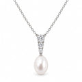 Stella three-stone rice pearl pendant necklace in sterling silver on white background