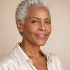 Woman in her sixties with silver hair wearing the Thea lavender pearl stud earrings