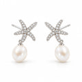 Therese pearl earrings, pavé starfish studs with 7-8mm white rice pearls hanging beneath - second finish