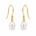 Ulla rice pearl French hook earrings, white freshwater pearls on sterling silver wire with coiled wrap