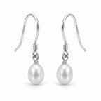 Ulla rice pearl French hook earrings, white freshwater pearls on sterling silver wire with coiled wrap - second finish