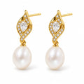 Yvonne pearl earrings, pear-cut crystals in leaf frames with 7-8mm white rice pearls beneath