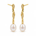 Zoe pearl earrings, long twisted pavé bars ending in 7-8mm white rice pearls